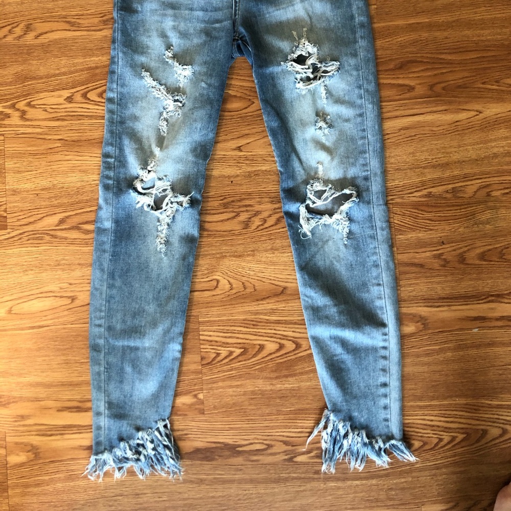 distress skinny jeans with bottoms fringe